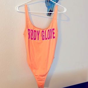 Body Glove retro smoothies one-piece swimsuit. Neon orange with hot pink letters